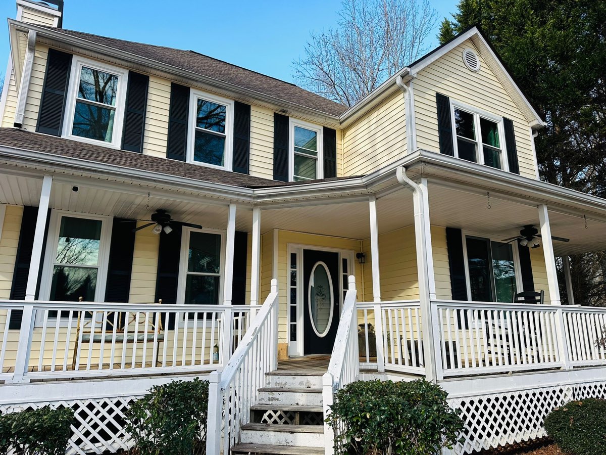 Farmhouse with wrap-around porch and new double-hung windows — Woodstock, GA